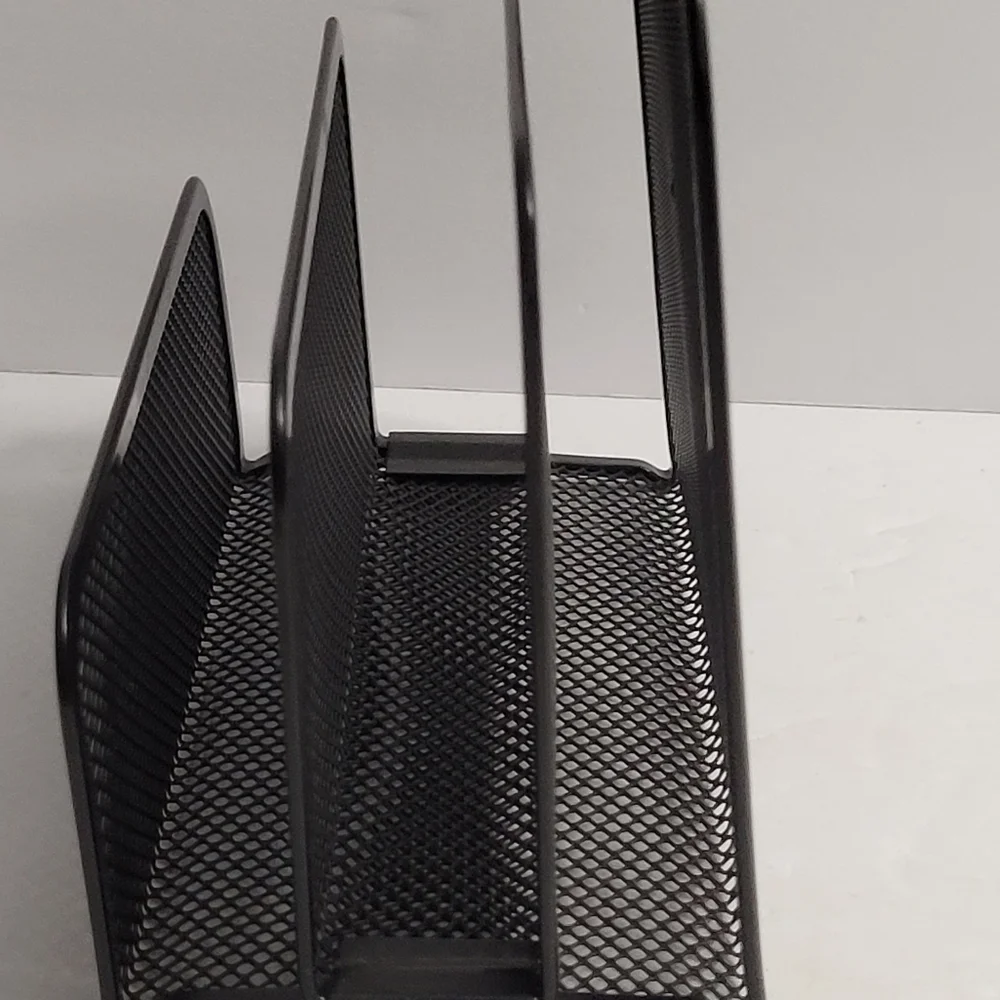 Black, three-tiered metal mesh file holder. 318